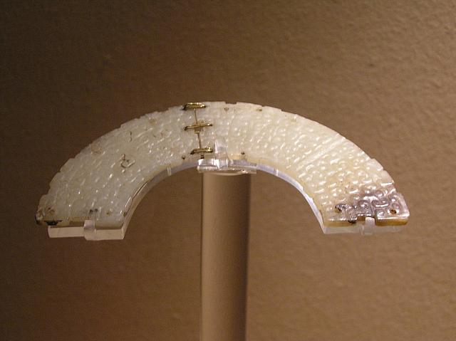 D) A hinge of jade threaded with gold.JPG