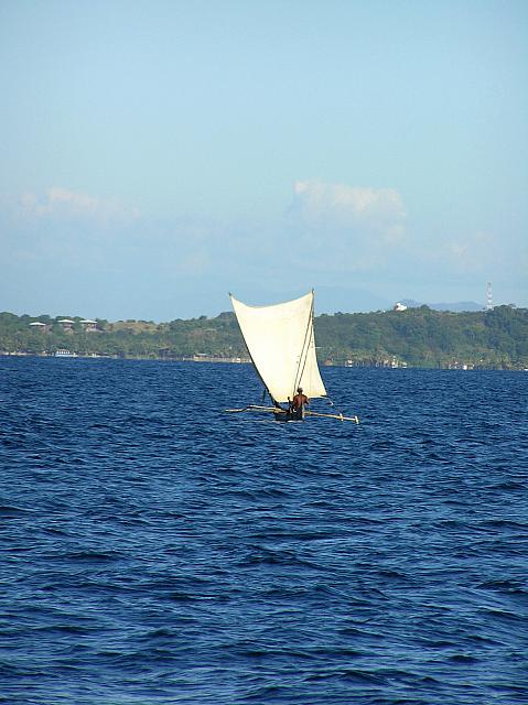 B) Outrigger sail