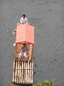 F) Bamboo raft with tourists.JPG