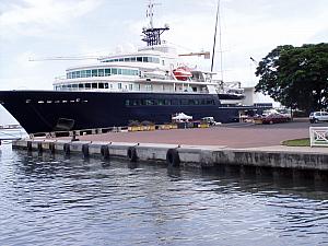 Mega-yacht in Papeete, notice the helicopter, sailboat submarine.jpg